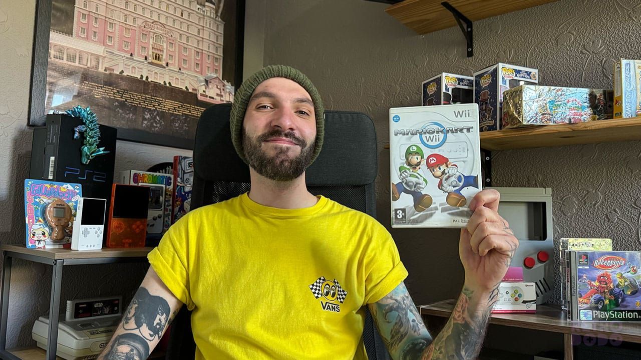 Seb holding Mario Kart Wii