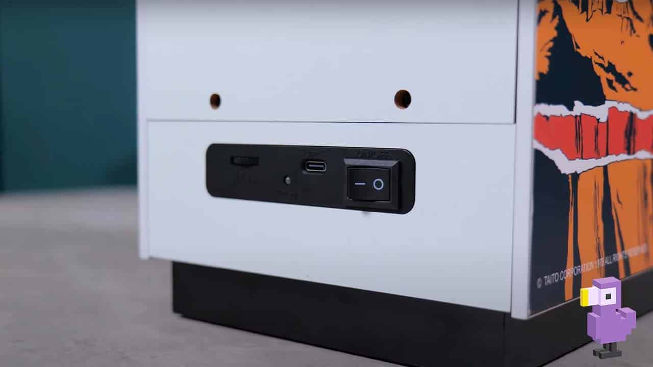 Power button on the back of the cabinet