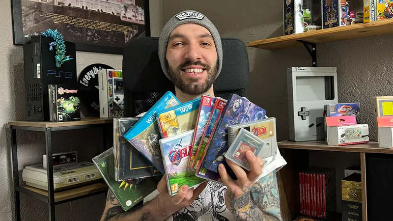 Seb holding his Zelda Games
